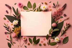 Flowers composition. Frame made of various flowers and leaves on pink background. Flat lay, top view, copy space photo