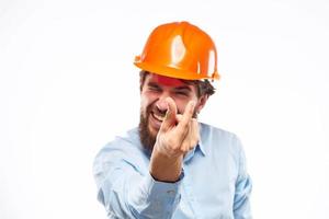 Emotional man in orange paint construction industry work lifestyle photo