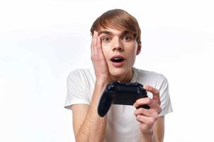 guy with joystick in hand video games entertainment light background photo