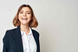 cheerful business woman in a suit work documents official Professional photo