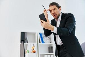 businessmen work emotions in front of laptop communication technology photo