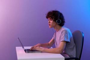 man in headphones in front of laptop entertainment Lifestyle technology photo