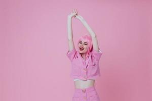 Positive young woman bright makeup pink hair glamor color background unaltered photo