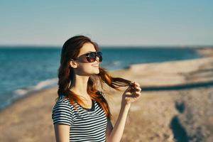 Woman outdoors summer landscape sun ocean nature photo