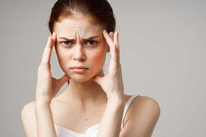 woman headache health problems stress isolated background photo