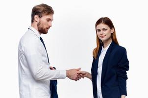 work colleagues shake hands communication contract light background photo