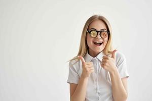 pretty woman in a white shirt with a folder in hand light background photo