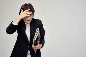 female manager with glasses self-confidence light background photo