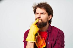 emotional man wearing rubber gloves detergent homework lifestyle professional photo