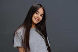 young woman in a t-shirt and jeans posing Youth style Lifestyle photo