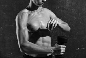 sports man inflated torso posing black and white photo fitness