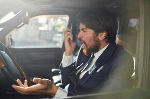 businessmen Driving a car trip luxury lifestyle success service rich photo