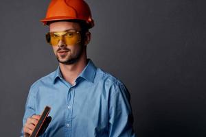 man builder professional working uniform emotions photo