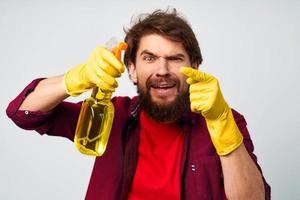 bearded man detergent rubber gloves rendering service cropped view professional photo