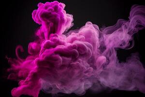 Purple and pink smoke isolated on black background. Abstract background. photo