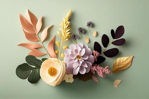 Creative layout made of flowers and leaves on grey background. Flat lay. Nature concept. photo