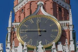 close up of clock on Spasskaya tower of Moscow Kremlin photo