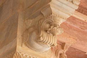 marble elephant as capital on column in palace of Amer Fort, India photo