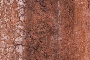 red grunge background, wall of old temple in India photo