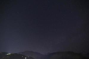 night sky above Himalayas mountains in Dharamshala, India photo