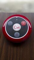 Wireless restaurant pager caregiver pager wireless nurse call system. Button transmitter calling system. photo