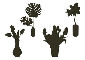 Vector silhouettes of flowers in a design vase. Tulip, amaryllis, monstera