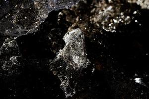 nteresting abstract background with ice close-up on a frozen puddle photo