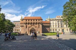 summer view of the Krakow barbican in Poland on a warm summer day photo
