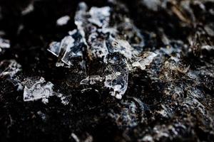 nteresting abstract background with ice close-up on a frozen puddle photo