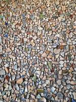 background from pieces of clay colored broken pottery decoration abstract photo