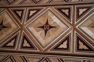 original background from an antique old wooden floor creating an interesting abstract pattern photo