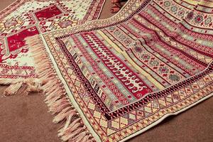 interesting background with handmade Turkish rugs in close-up photo