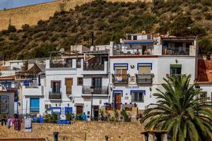 l historic old colorful houses Barrio Santa Cruz Alicante Spain on a sunny day photo