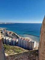 landscape of the city of Alicante panorama from the viewpoint of the city and the port on a warm sunny day photo