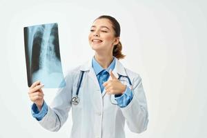 cheerful woman doctor in white coat x-ray emotion diagnosis photo