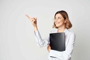 cheerful woman manager in white shirt documents work professional photo