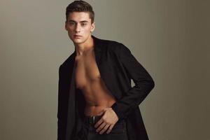 Man in black unbuttoned shirt attractive trendy lifestyle photo