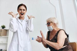 emotional elderly woman syringe injection fun photo