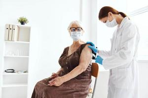 female doctor vaccine passport hospital treatment photo