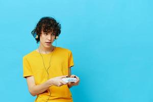 man in headphones plays games gamepad Lifestyle entertainment photo