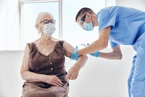 elderly woman in hospital immunity protection patient treatment photo