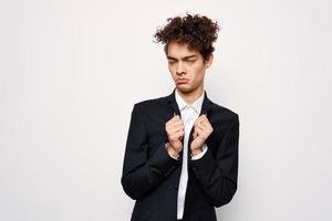 business man in suit curly hair confident elegant style photo