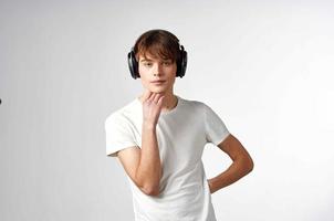 Guy in headphones listen to music entertainment technology photo