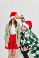 cheerful young couple hugs new year holiday friendship romance gifts photo