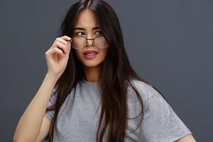 portrait woman in round glasses smile posing close-ups isolated background photo