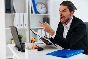 Man emotions work office desk boss photo