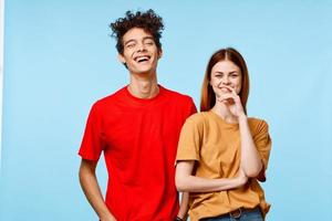 a guy and a girl in colorful t-shirts more fun studio modern style photo