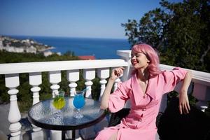fashionable woman restaurant terrace landscape rest Happy female relaxing photo