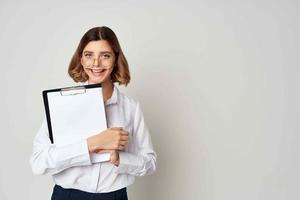 cheerful business woman in white shirt documents copy space office photo