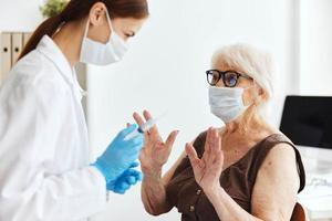 elderly woman immunization safety virus epidemic photo